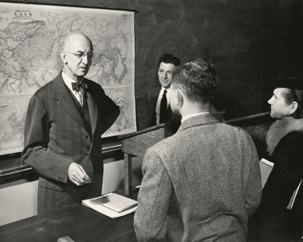 Robinson at the lectern teaching in the late 1940s