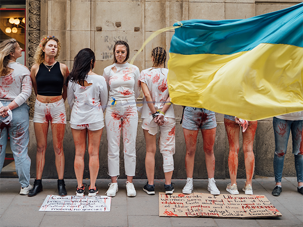 A photo of a group of women protesting sexual violence in Ukraine.
