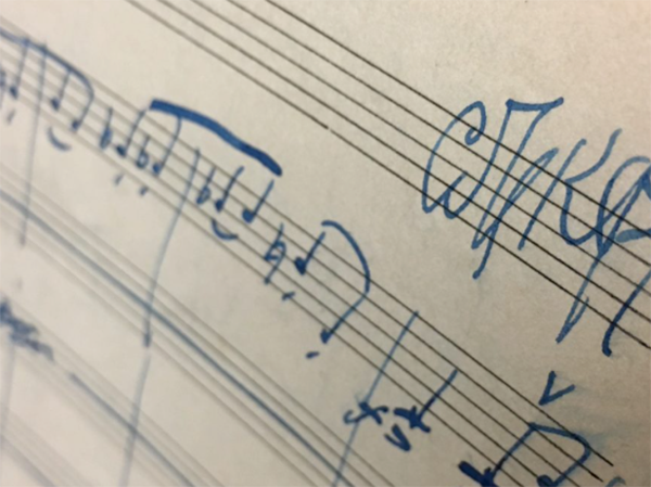 2023-06-15-16 Prokofiev Symposium Image of music handwritten on staff. Links to event info.