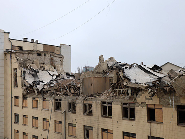 Image of a destroyed university. Image links to event page.