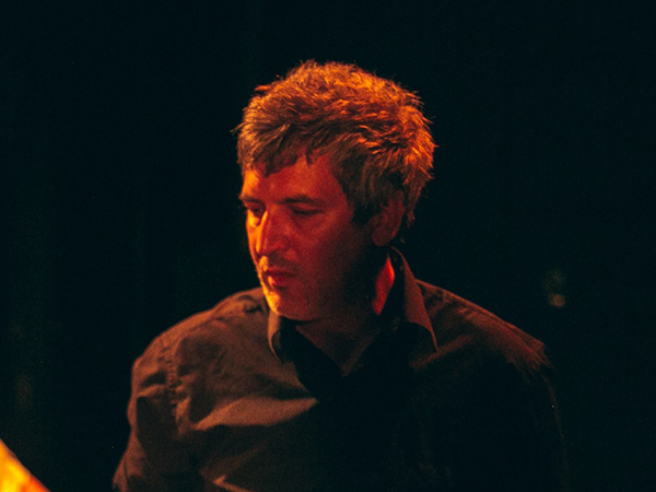 Photo of Semyon Khan. Image links to event page.