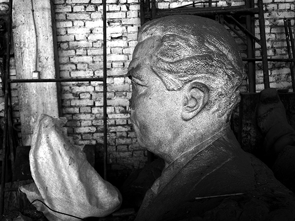 Sideways view of a statue. Image links to event page.