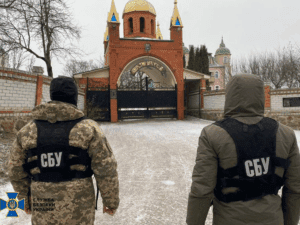 Image of soldiers in front of a church. Image links to event page.