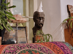 Image of Masaryk in a cafe. Image links to event page.