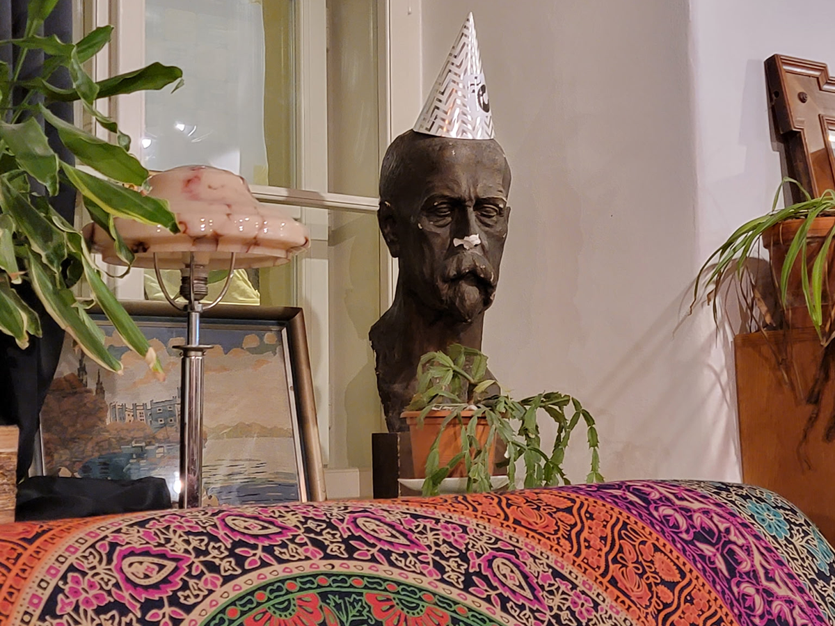 Image of Masaryk in a cafe. Image links to event page.